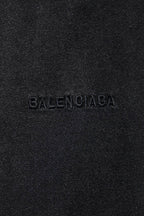 Balenciaga logo embroidery on dark gray fabric