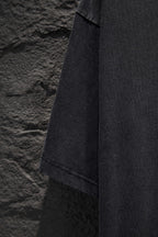 Balenciaga T-shirt hem and side seam view, dark gray fabric