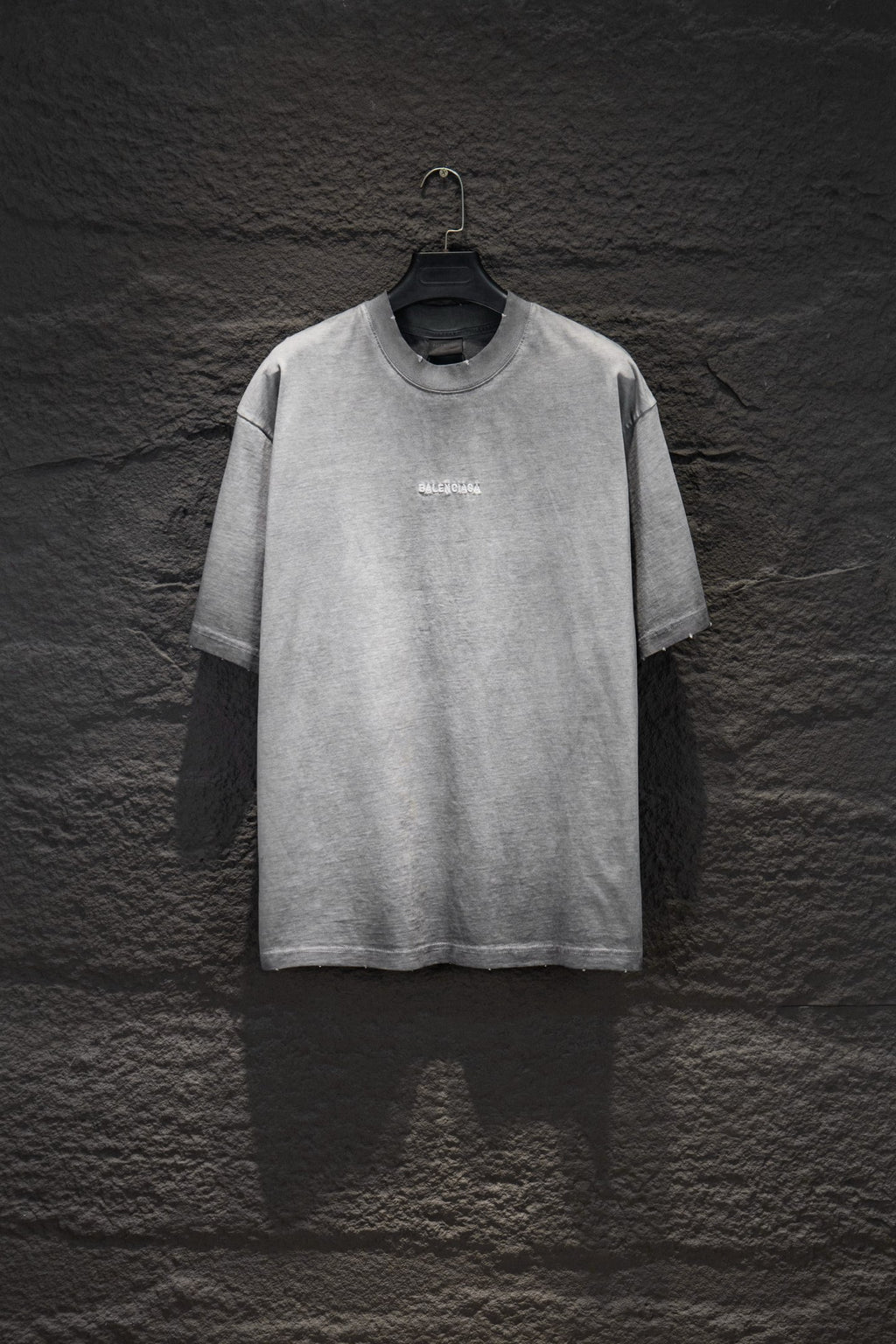 Balenciaga short-sleeve T-shirt, light gray with small chest logo.