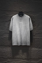 Balenciaga short-sleeve T-shirt, light gray with small chest logo.