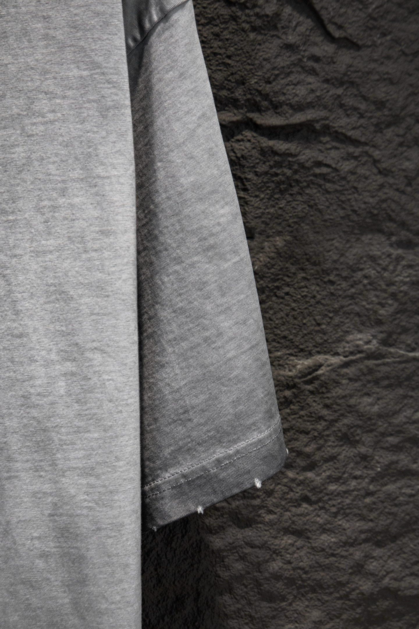 Balenciaga T-shirt sleeve and side seam, light gray.