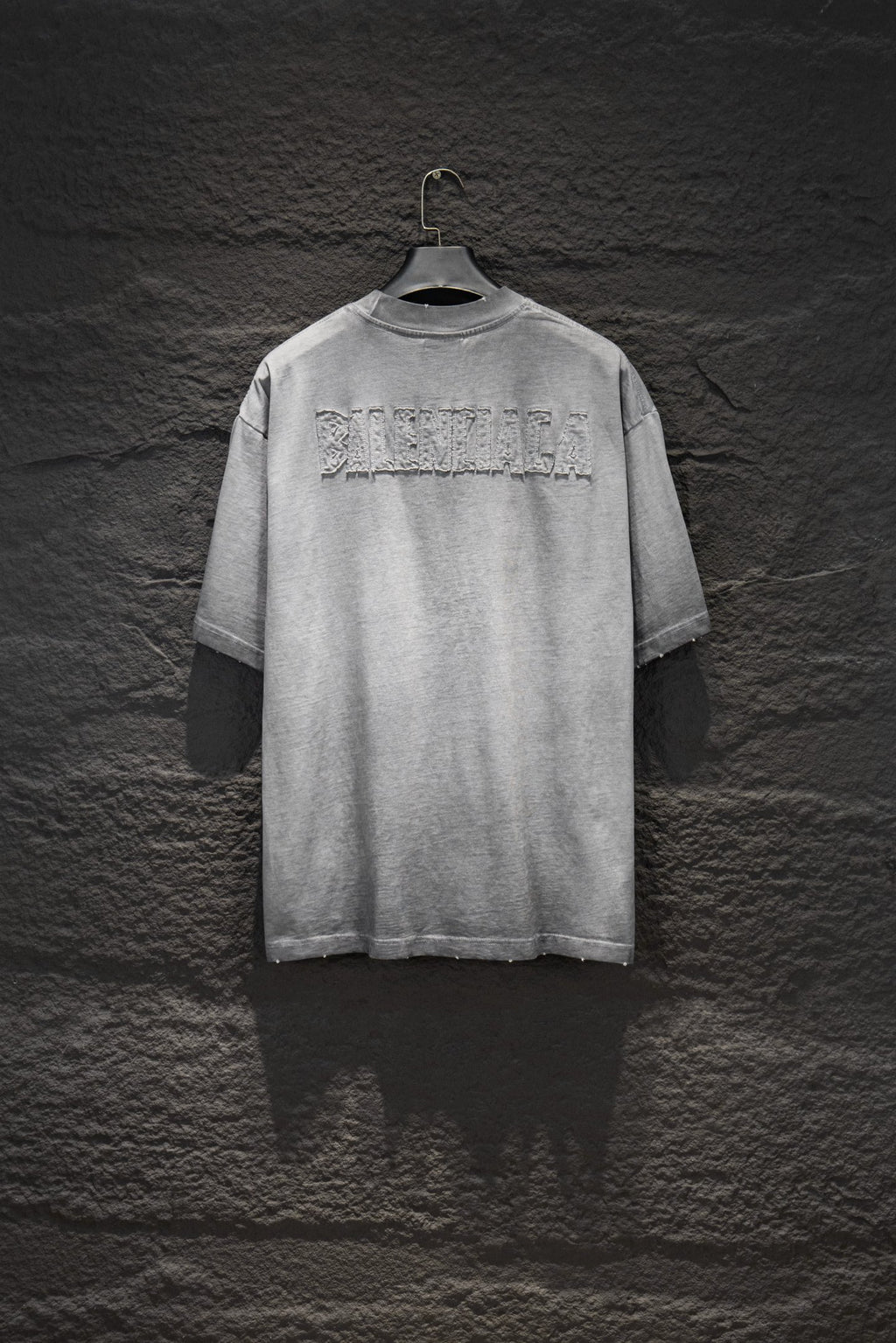 Balenciaga short-sleeve T-shirt, light gray with large back text logo.