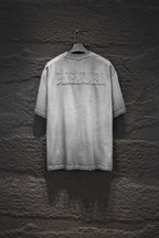 Balenciaga short-sleeve T-shirt, light gray with large back text logo.