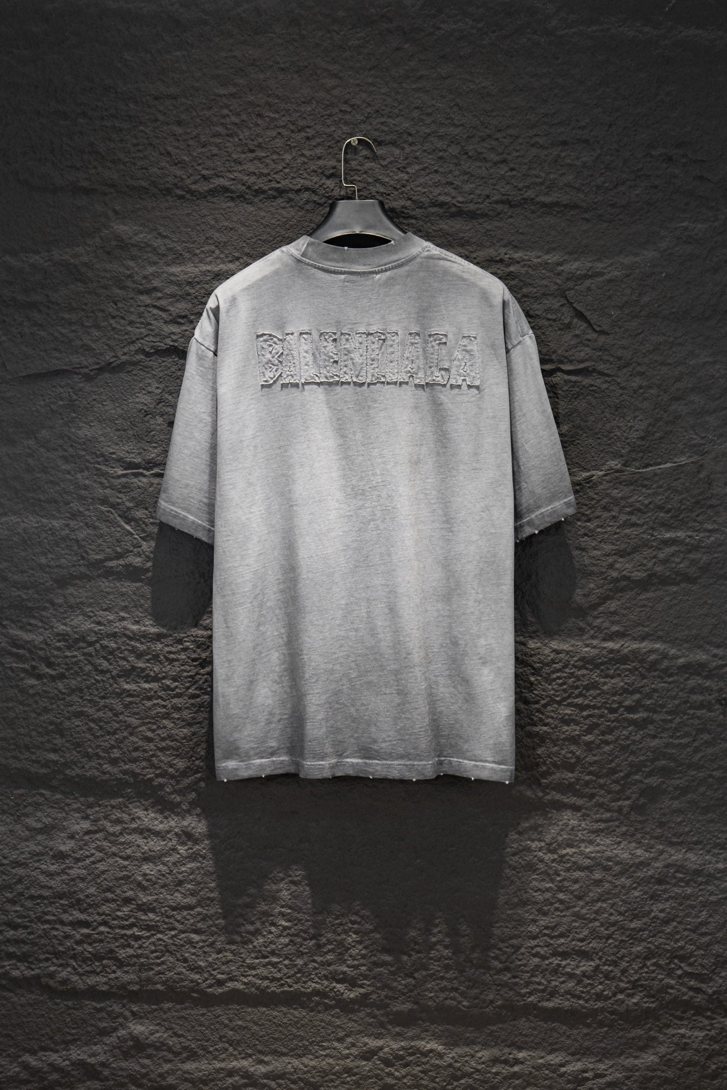 Balenciaga short-sleeve T-shirt, light gray with large back text logo.