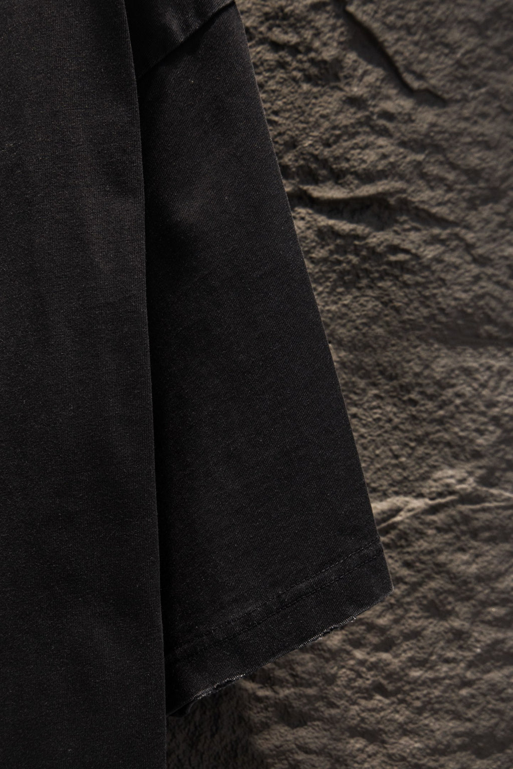 Balenciaga black short-sleeve T-shirt side view with stitched hem
