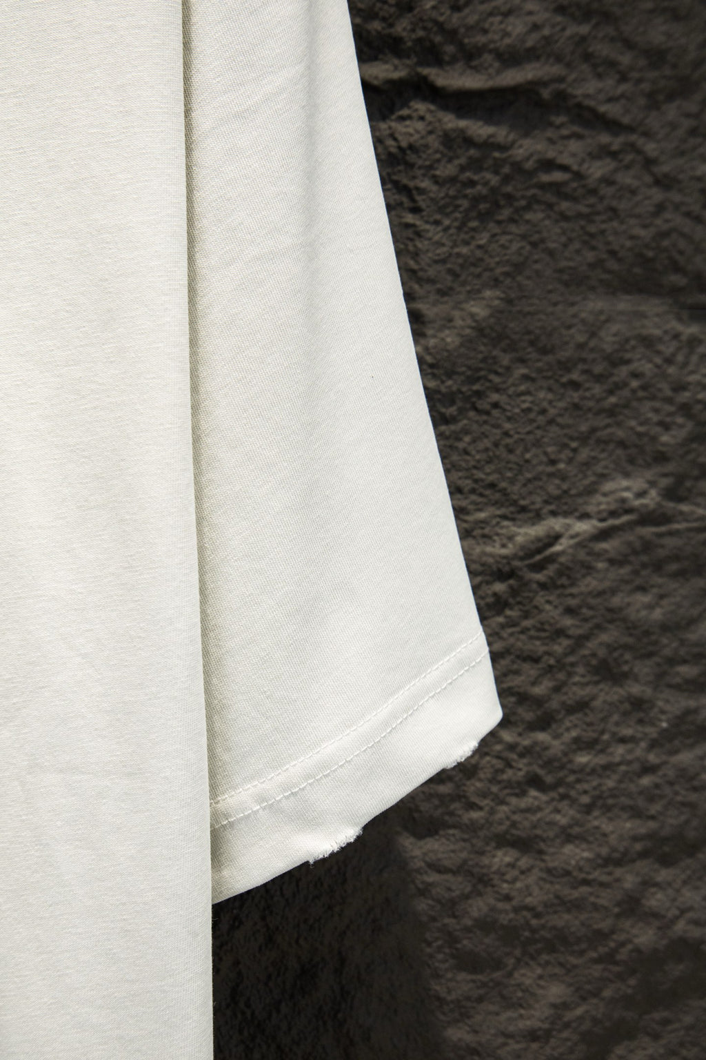 Balenciaga white short-sleeve T-shirt close-up of sleeve and hem