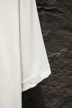 Balenciaga white short-sleeve T-shirt close-up of sleeve and hem
