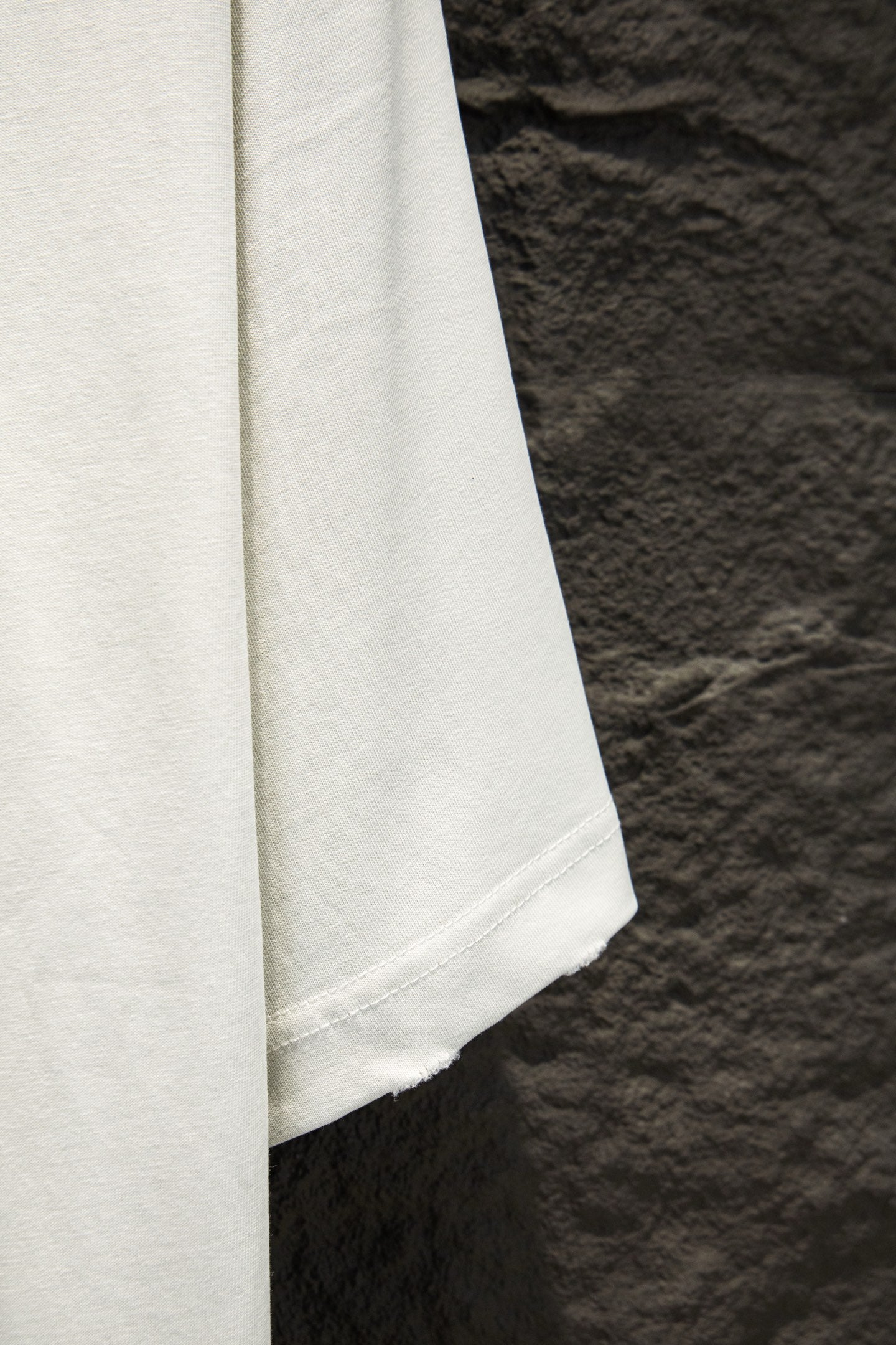 Balenciaga white short-sleeve T-shirt close-up of sleeve and hem