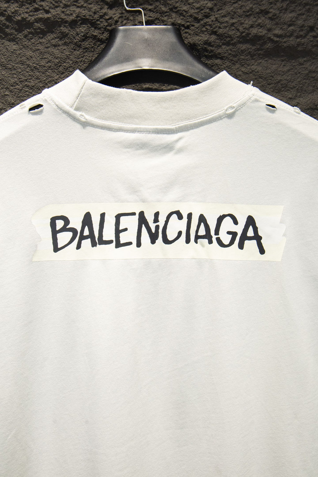 Balenciaga white T-shirt with large black BALENCIAGA logo across chest