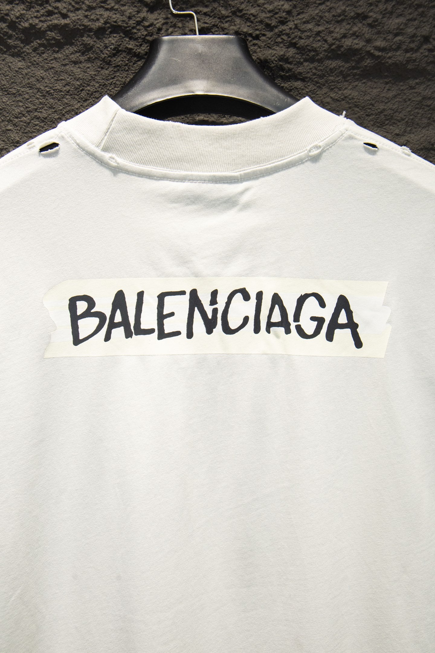 Balenciaga white T-shirt with large black BALENCIAGA logo across chest