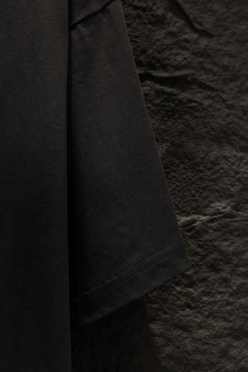 Balenciaga black T-shirt side view with stitched hem