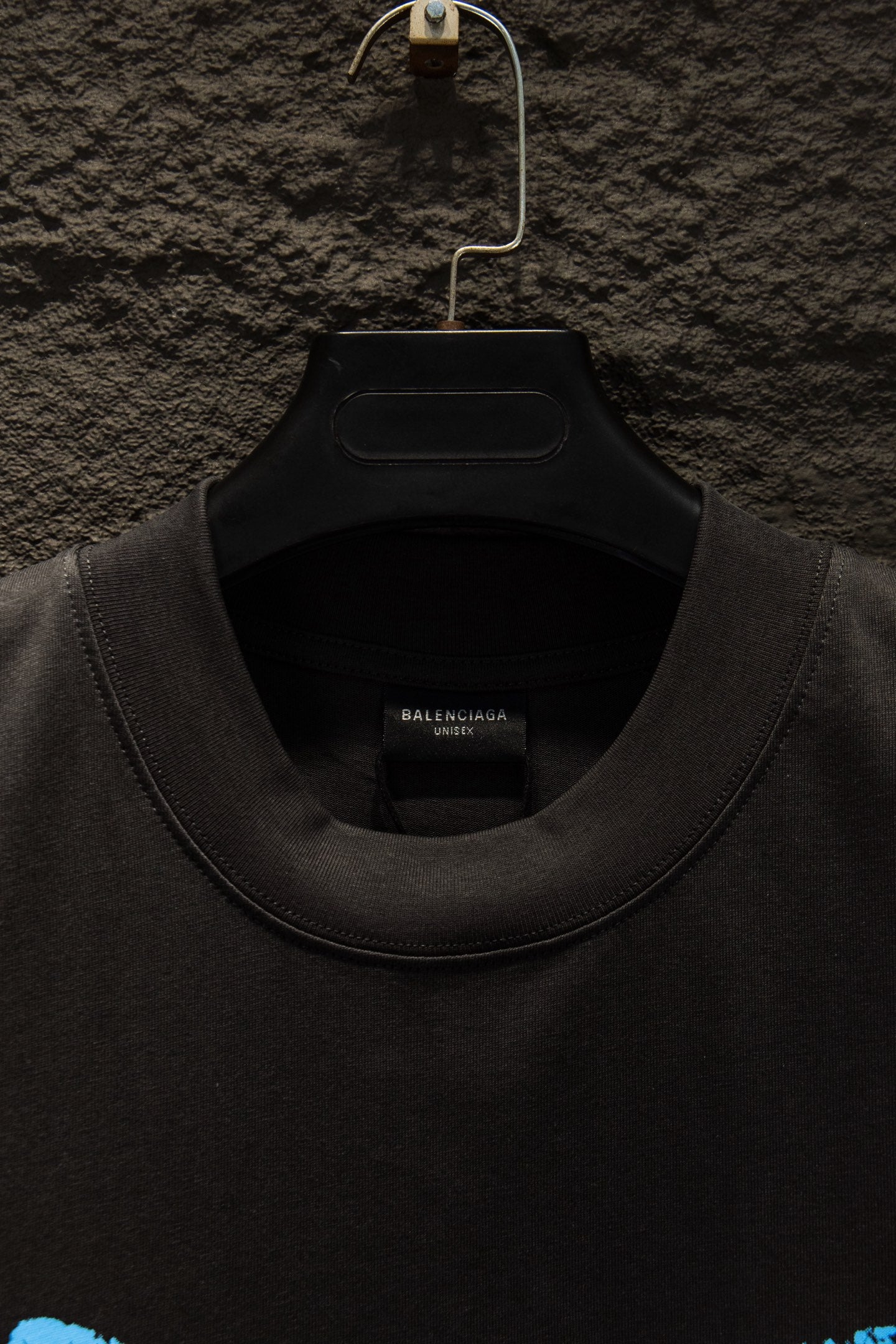 Balenciaga black T-shirt close-up of crew neck and inner label