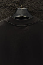 Balenciaga black T-shirt collar close-up with crew neckline