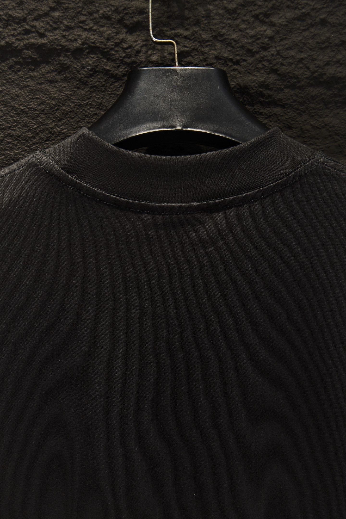 Balenciaga black T-shirt collar close-up with crew neckline