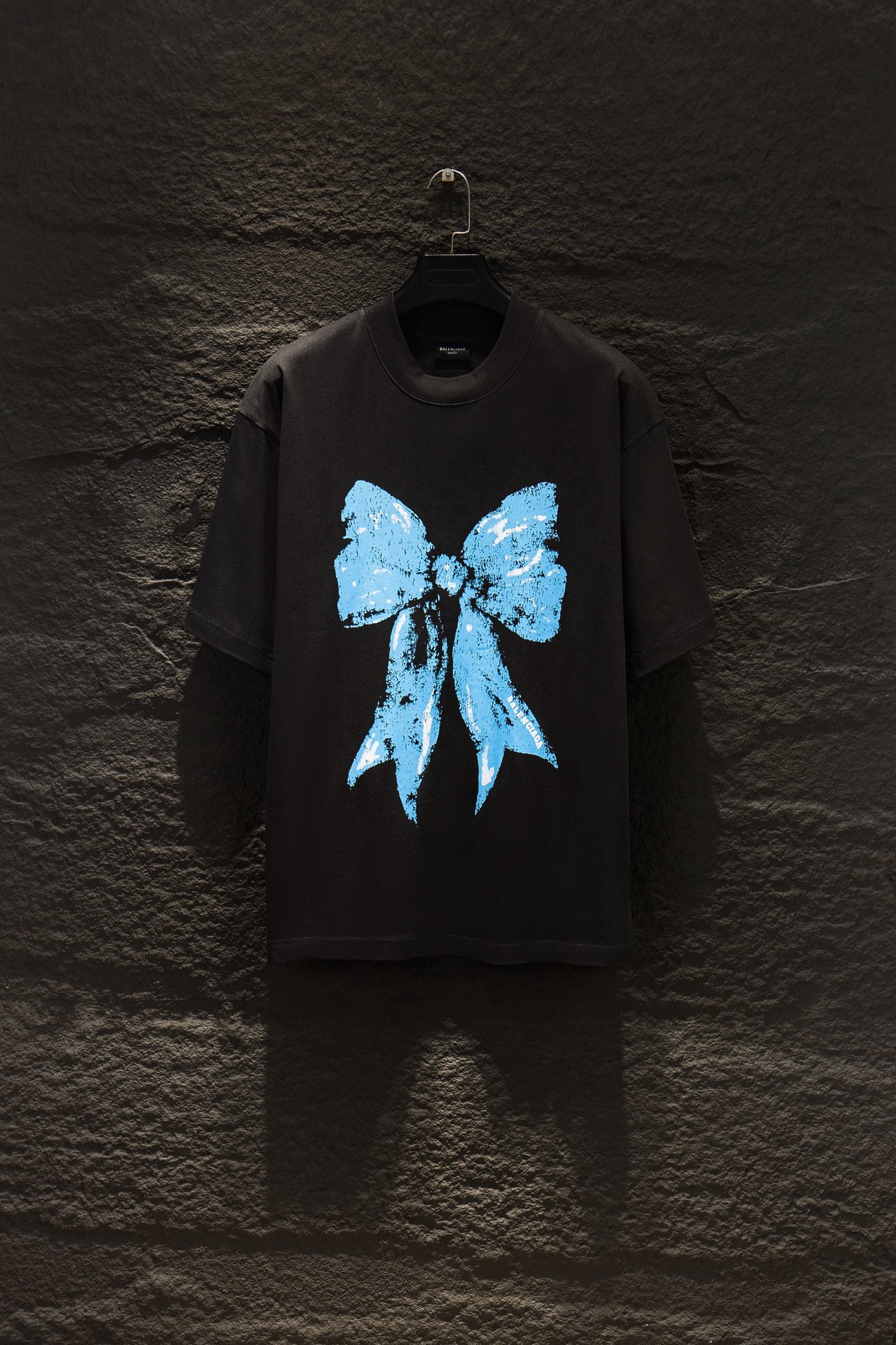 Balenciaga black T-shirt with blue bow graphic front