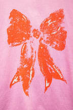 Balenciaga pink T-shirt with large orange bow print