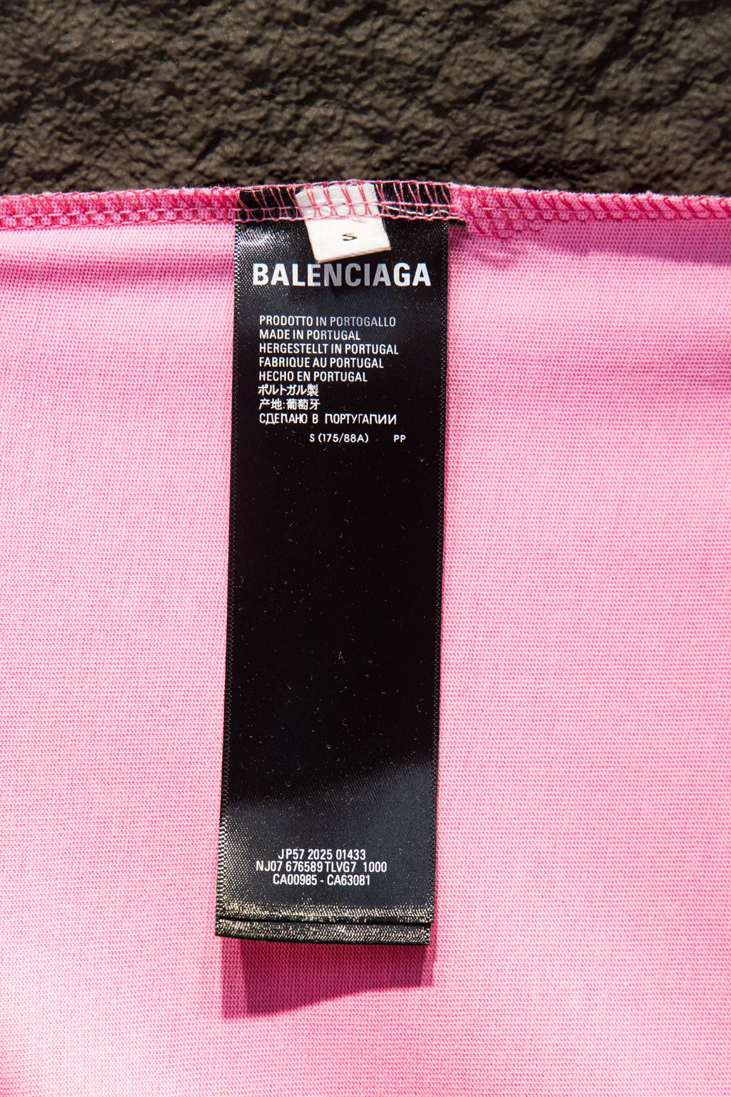 Balenciaga pink T-shirt fabric label with care and size text