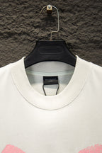 White crew-neck T-shirt with ribbed collar and Balenciaga label at neckline