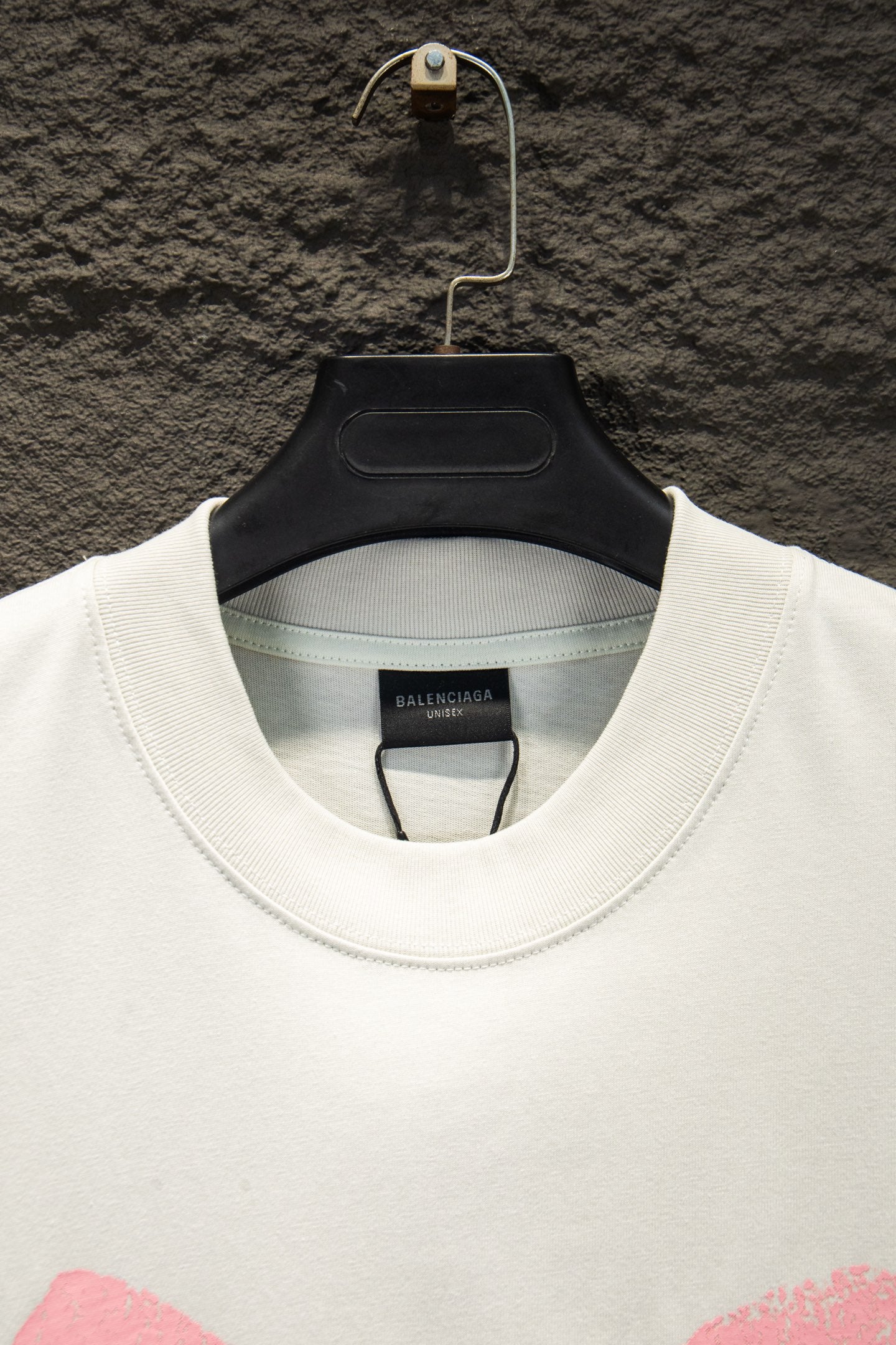 White crew-neck T-shirt with ribbed collar and Balenciaga label at neckline