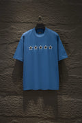 Blue short-sleeve T-shirt with five star graphics across the chest