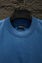 Blue crewneck T-shirt with ribbed collar and inner neck label