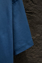 Blue short-sleeve T-shirt with draped side profile