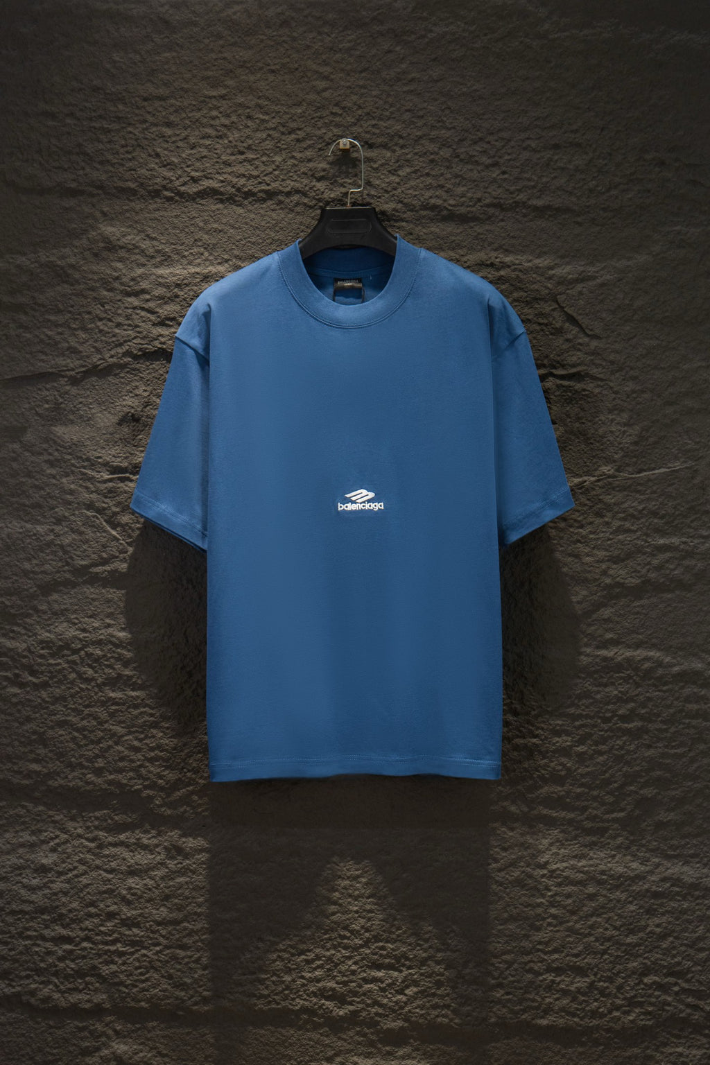 Blue short-sleeve T-shirt with small white chest logo print