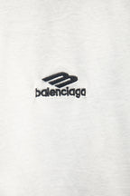 White T-shirt with small black balenciaga logo mark.