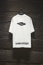 White Balenciaga short-sleeve T-shirt with large logo graphic and balenciaga text.