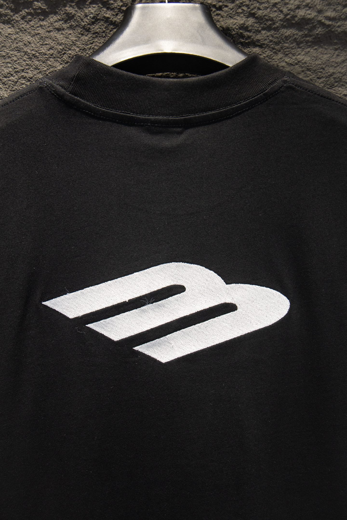 Balenciaga black short-sleeve T-shirt with large white graphic on chest