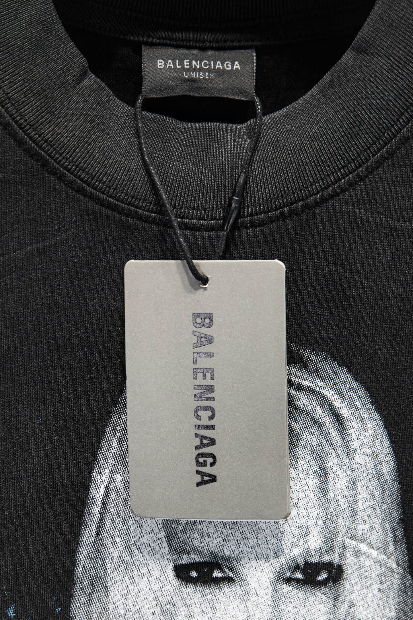 Balenciaga T-shirt with crewneck and hang tag at collar reading BALENCIAGA