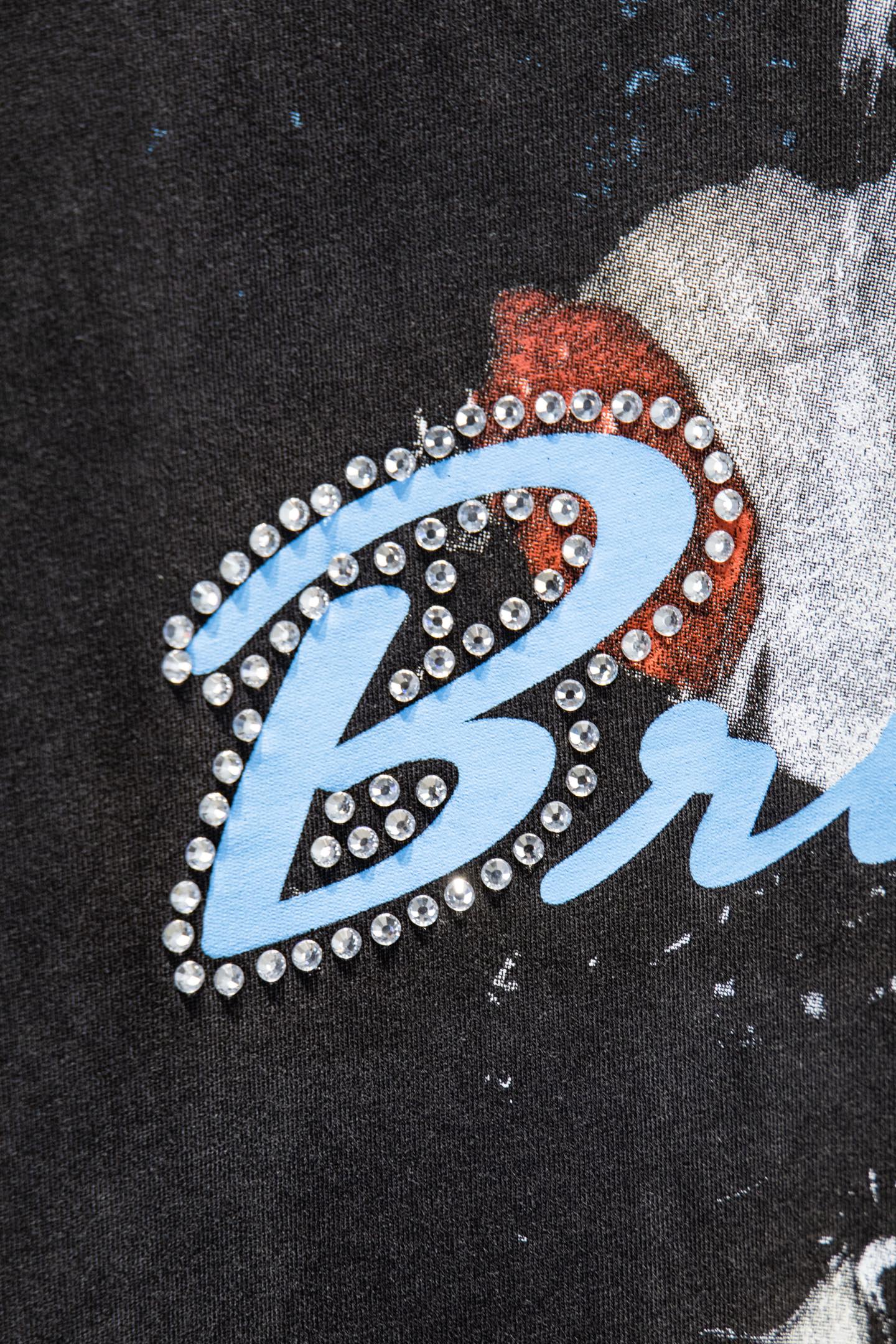 Balenciaga T-shirt detail with rhinestone letter graphic and blue outline
