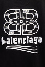 Black Balenciaga T-shirt with oversized circular and text logo graphic