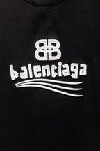Black Balenciaga T-shirt with white Balenciaga logo and wave graphic