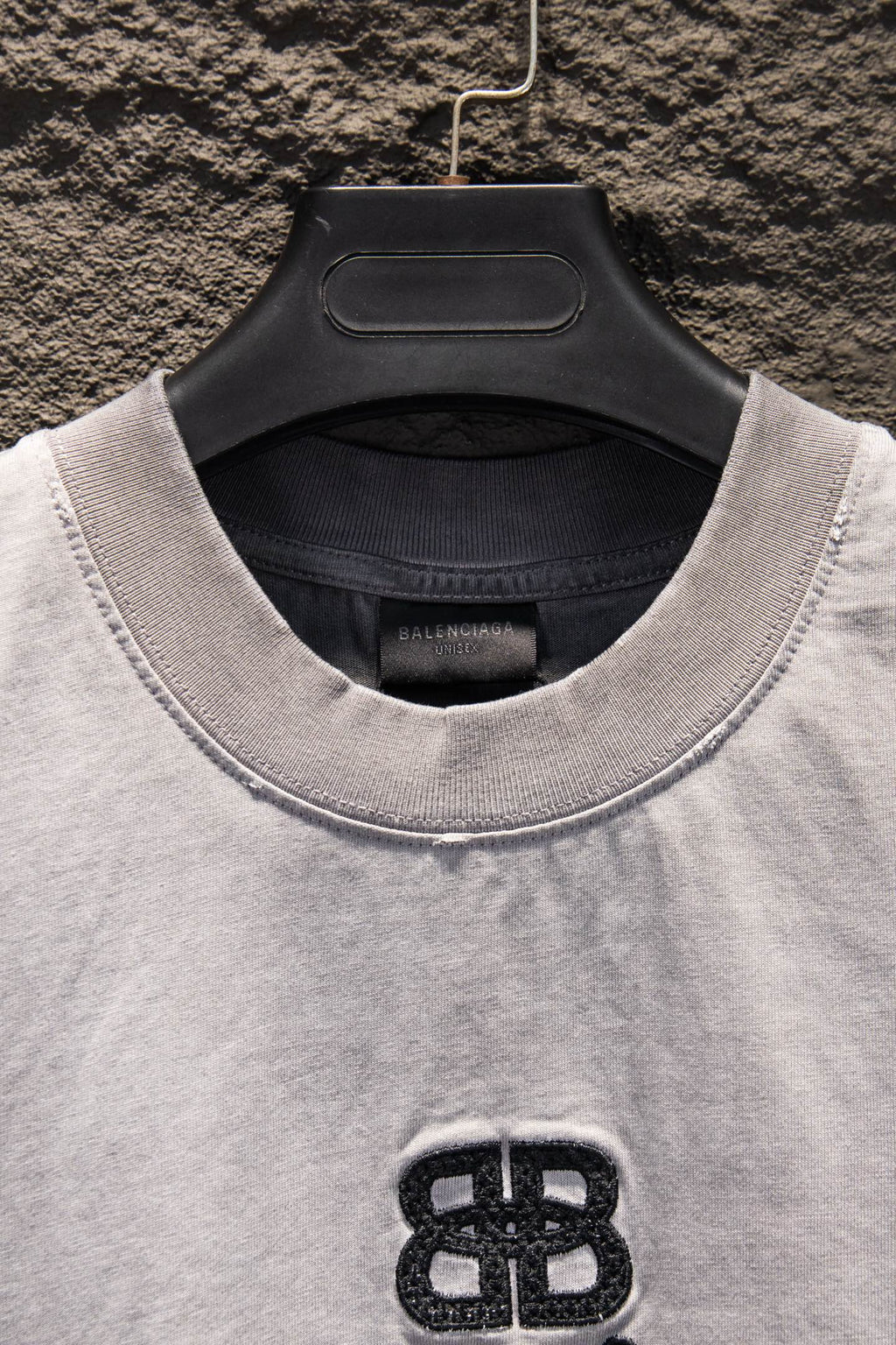 Light gray crewneck T-shirt collar with small Balenciaga logo embroidery