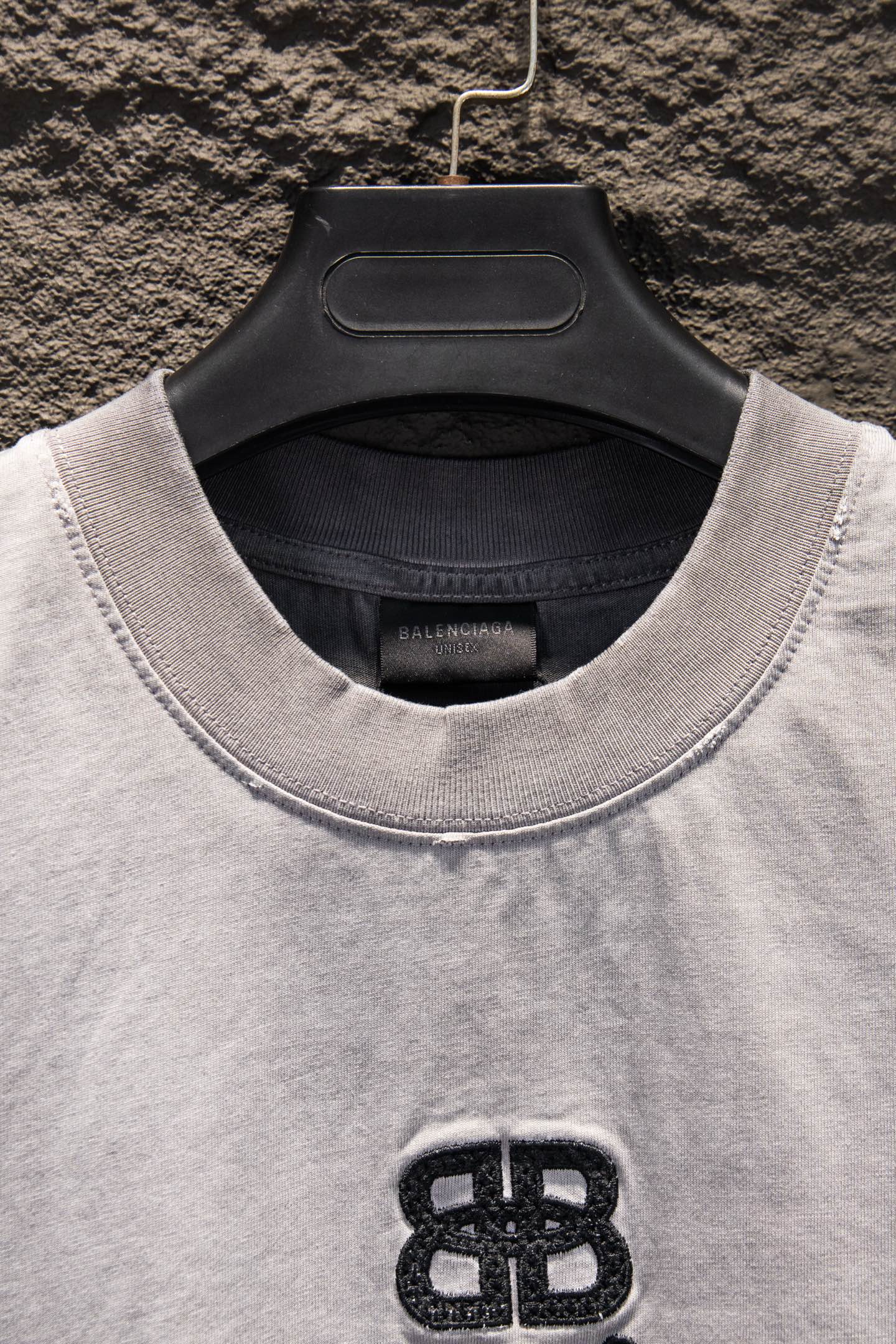 Light gray crewneck T-shirt collar with small Balenciaga logo embroidery