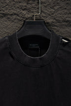 Balenciaga short-sleeve T-shirt neckline detail with brand label, black
