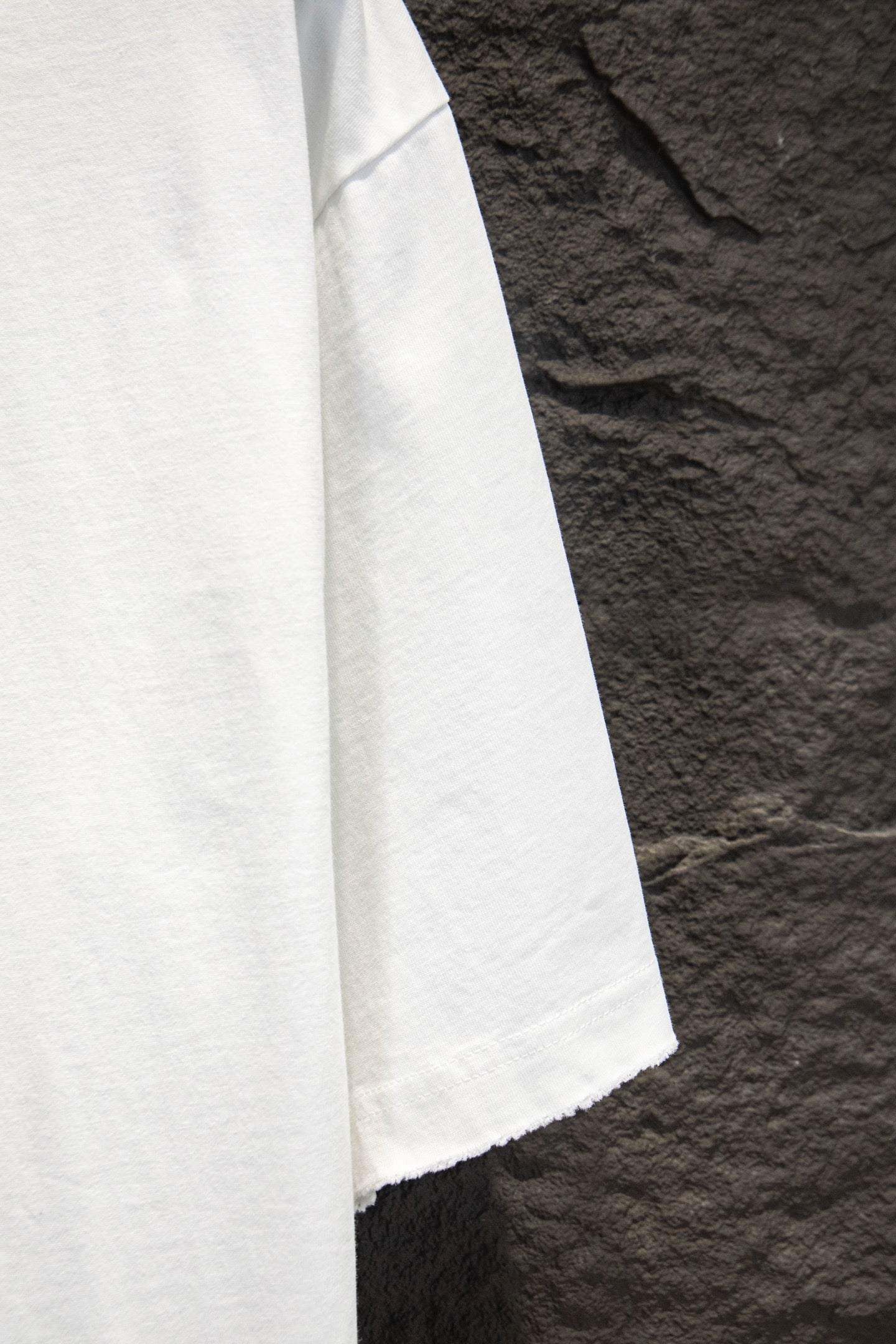 White short-sleeve T-shirt side view with straight hem