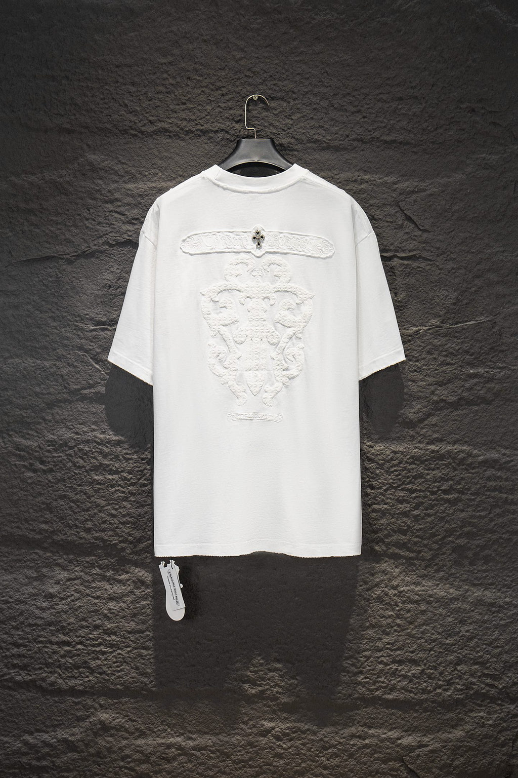 White short-sleeve T-shirt with large embossed back graphic