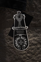 Black T-shirt with Chrome Hearts brand graphic hang tag