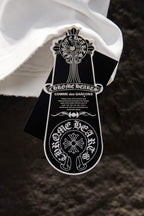 White T-shirt interior neckline with hanging Chrome Hearts tag