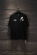 Black short-sleeve T-shirt with white cross and graphic print on chest