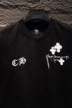 Black short-sleeve T-shirt close-up of neckline and left chest logo