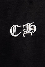 Black short-sleeve T-shirt close-up of white C B emblem