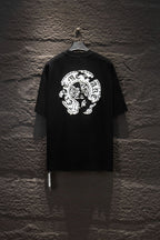 Black short-sleeve T-shirt with large white graphic emblem centered on the chest