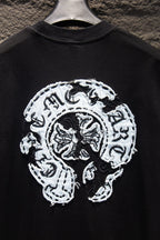 Black short-sleeve T-shirt with large white graphic logo at the center