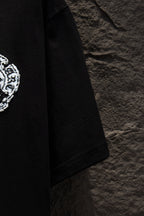 Black short-sleeve T-shirt side view with straight hem and sleeve seam