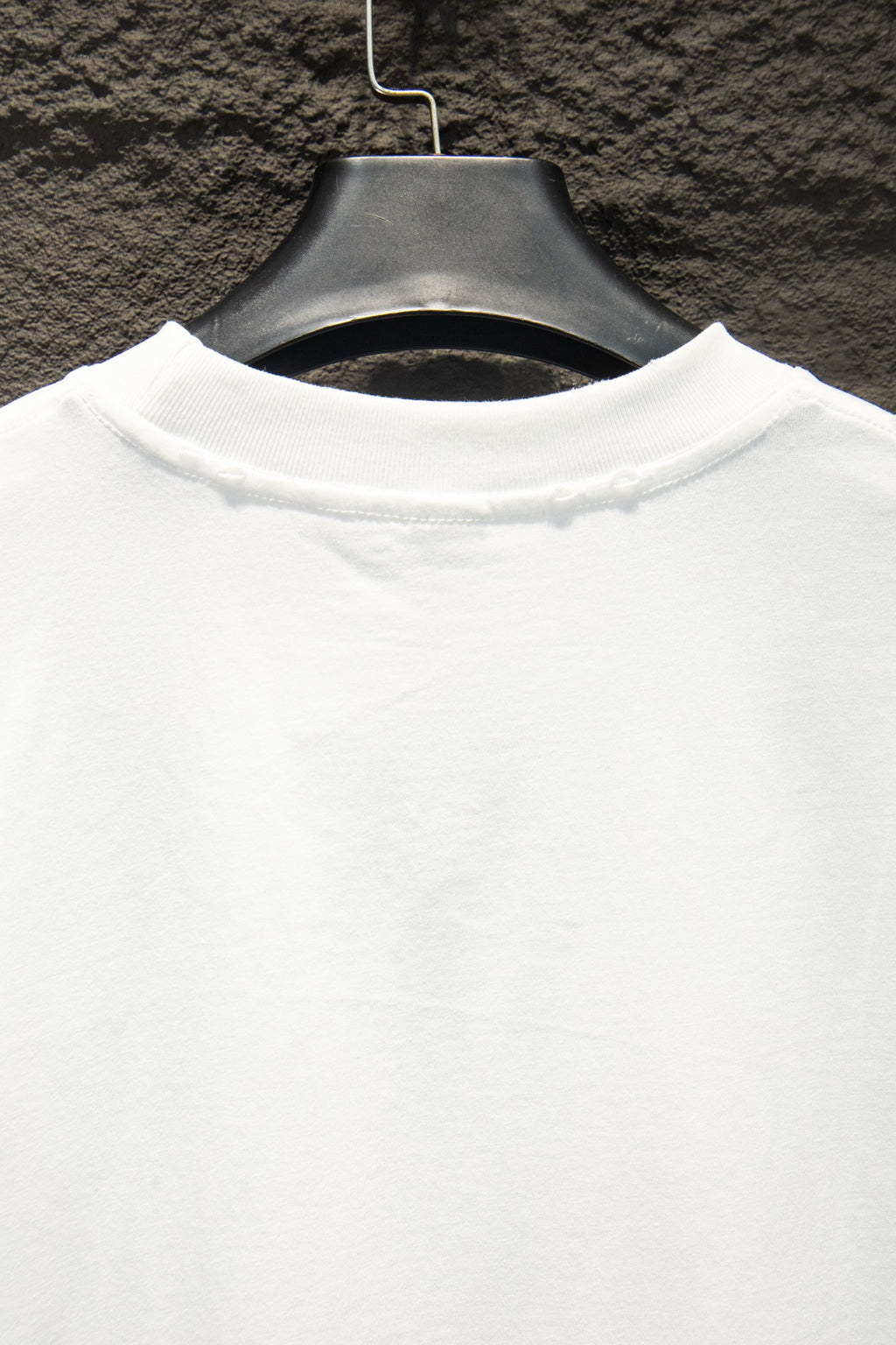 White short-sleeve T-shirt with crew neck, no visible print