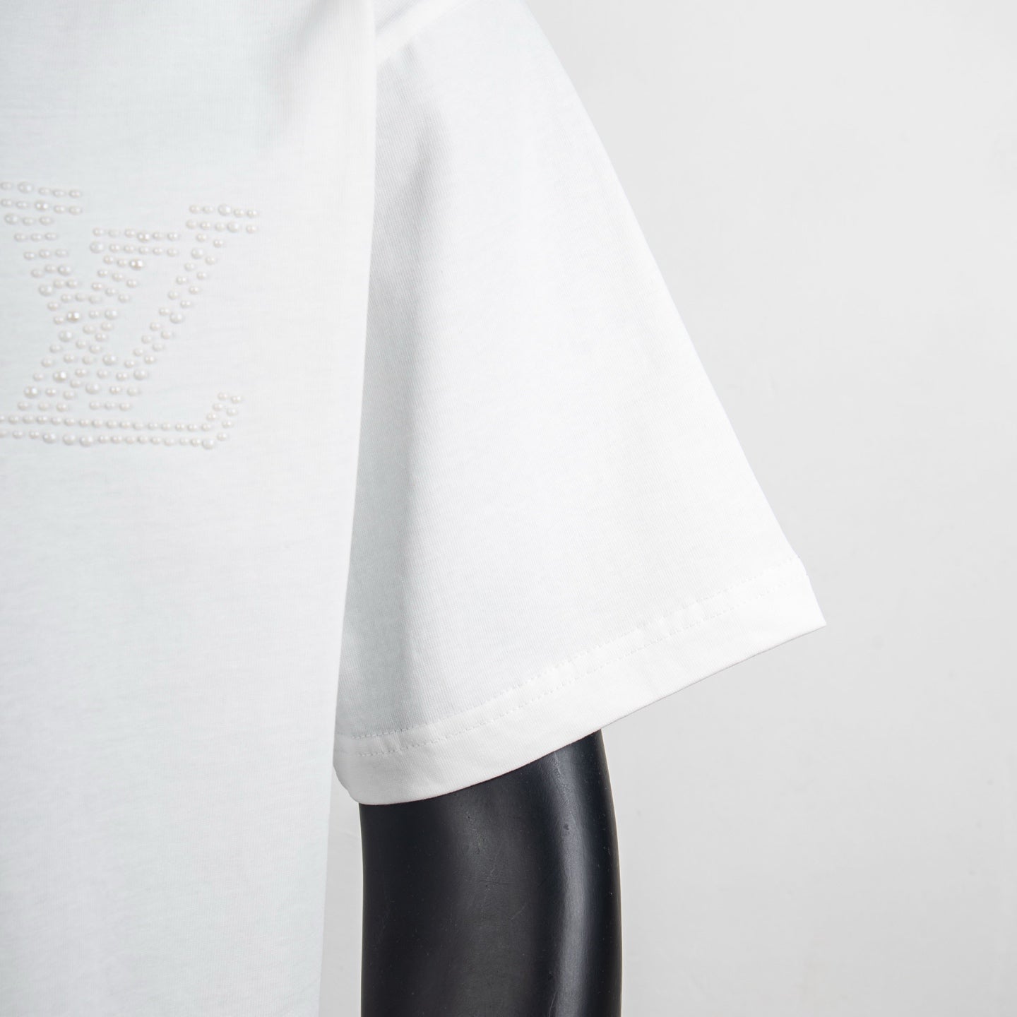Louis Vuitton white T-shirt with studded emblem on front side