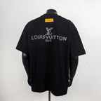 Black T-shirt with rhinestone Louis Vuitton logo on back and yellow neck label